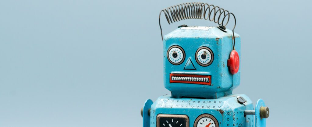 Photo of a old-fashioned tin robot with a worried expression